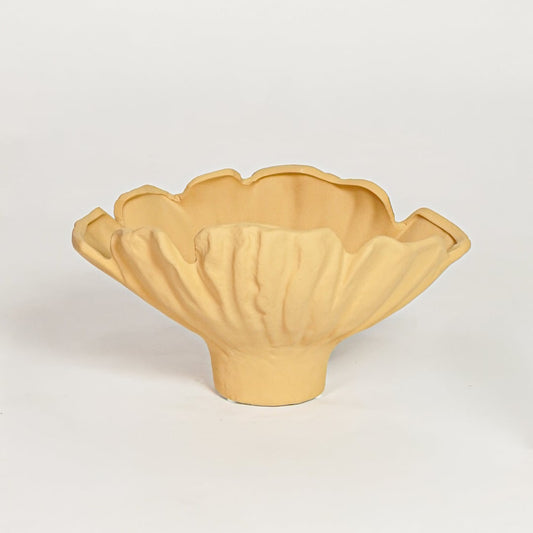 Yellow sagaform ceramic decorative bowl with fluted edges isolated on clean white background for modern decor styling.