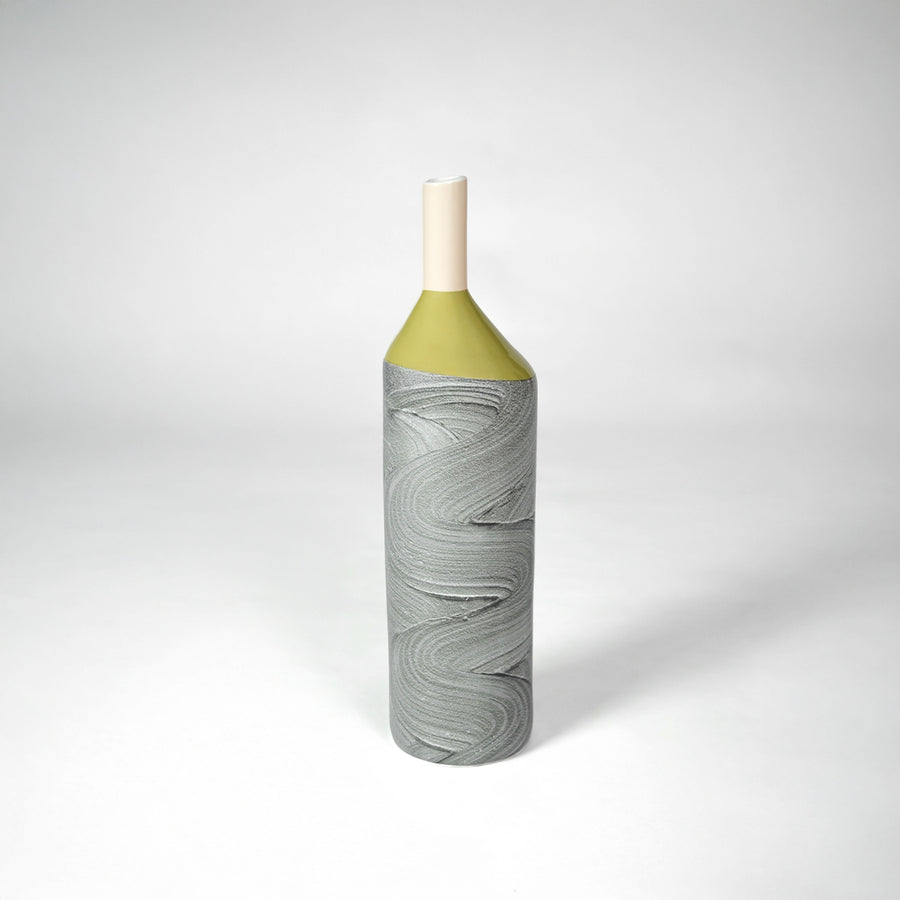 Grey textured ceramic vase with gold neck for elegant shelf placement and modern indoor home decor styling accent.
