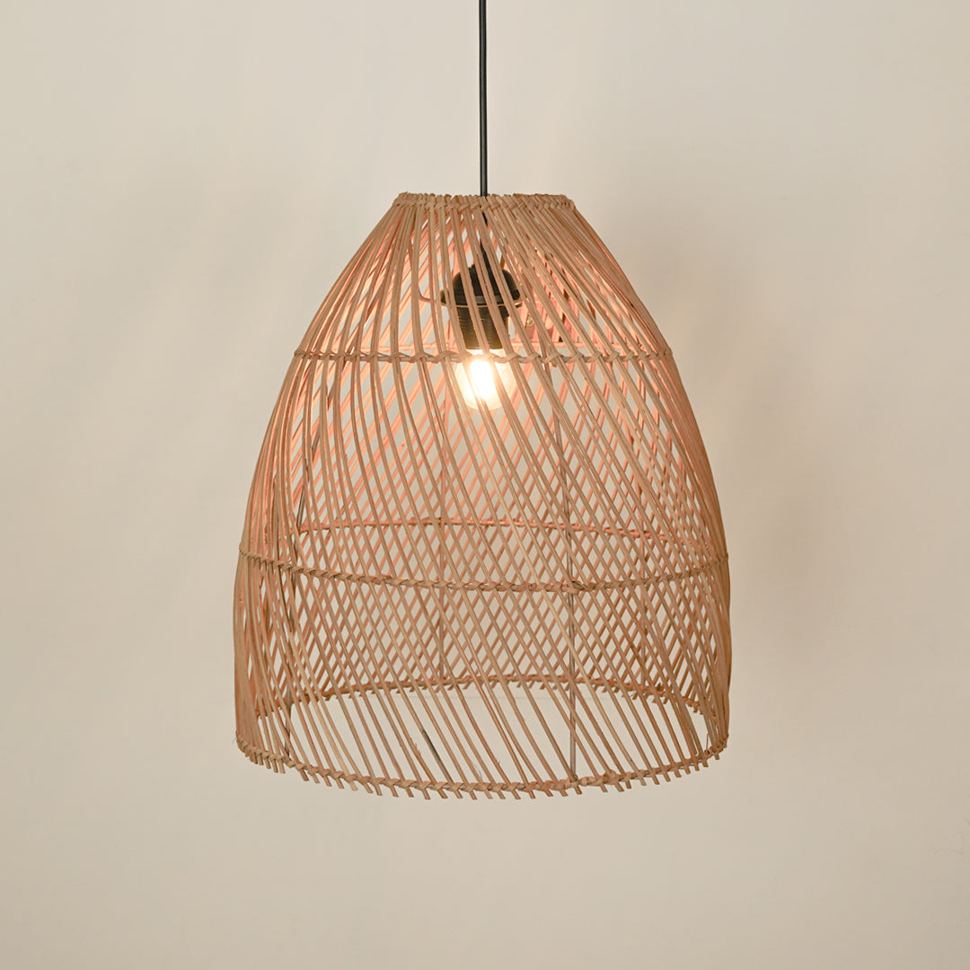 Natural rattan pendant light illuminated with warm glow for stylish dining room ceiling decor.
