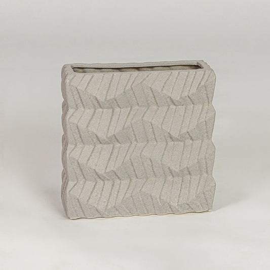 Beige ceramic decorative vase with textured finish modern flower vase for shelf console table decor styling.