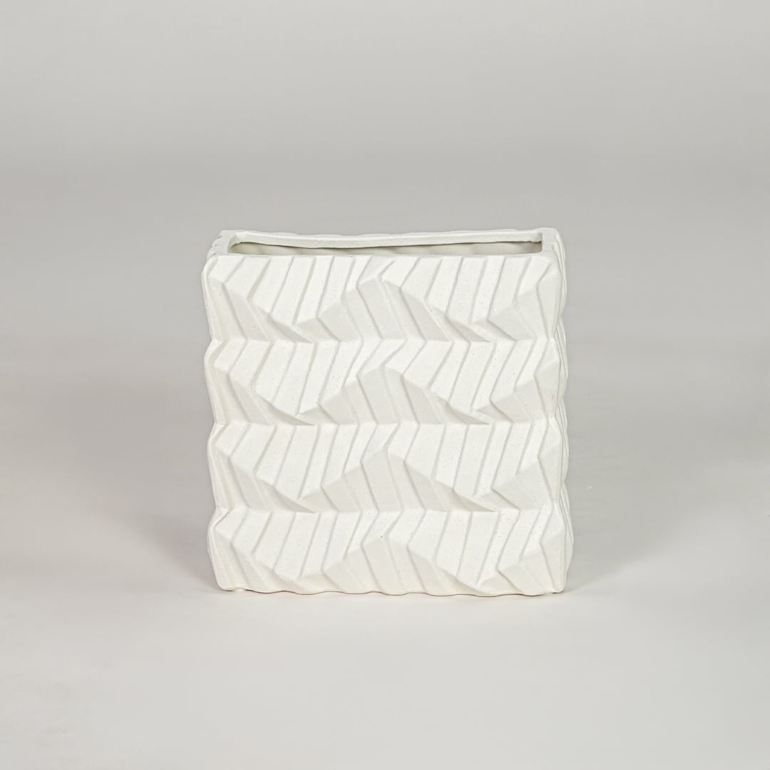 White ceramic decorative vase with textured pattern modern flower vase for tabletop shelf console living room decor styling.