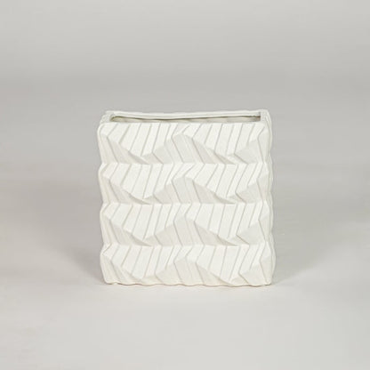 White ceramic decorative vase with textured pattern modern flower vase for tabletop shelf console living room decor styling.