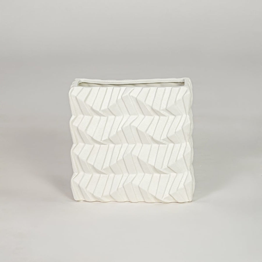 White ceramic decorative vase with textured pattern modern flower vase for tabletop shelf console living room decor styling.