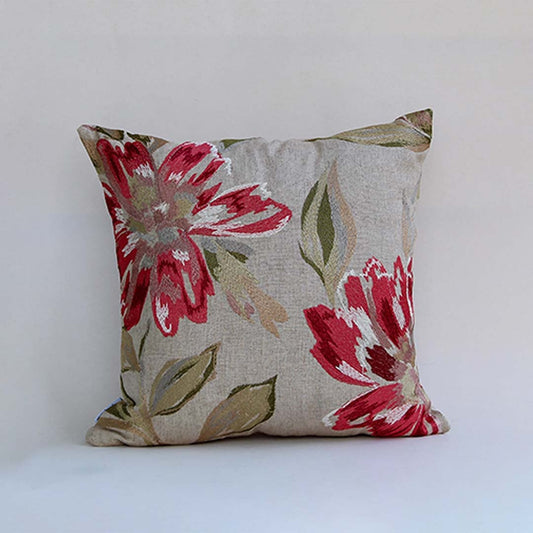 Beige cushion cover with bold red floral print on textured fabric designed for sofa chair and bed home decor styling.