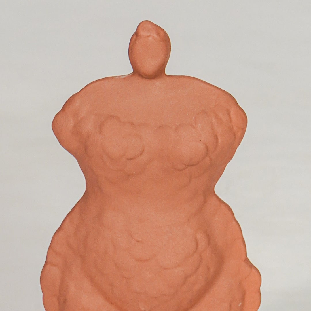 Terracotta ceramic decor sculpture closeup modern decorative showpiece for table console living room decor styling.