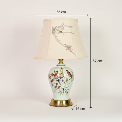 Mint green ceramic table lamp showing 57 cm height 36 cm shade width and 16 cm base diameter for bedside use.