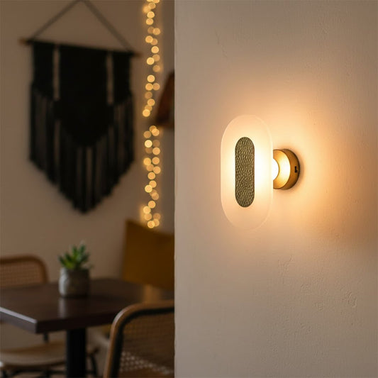 Modern gold textured wall light with warm ambient glow for stylish bedroom and premium decor spaces.

