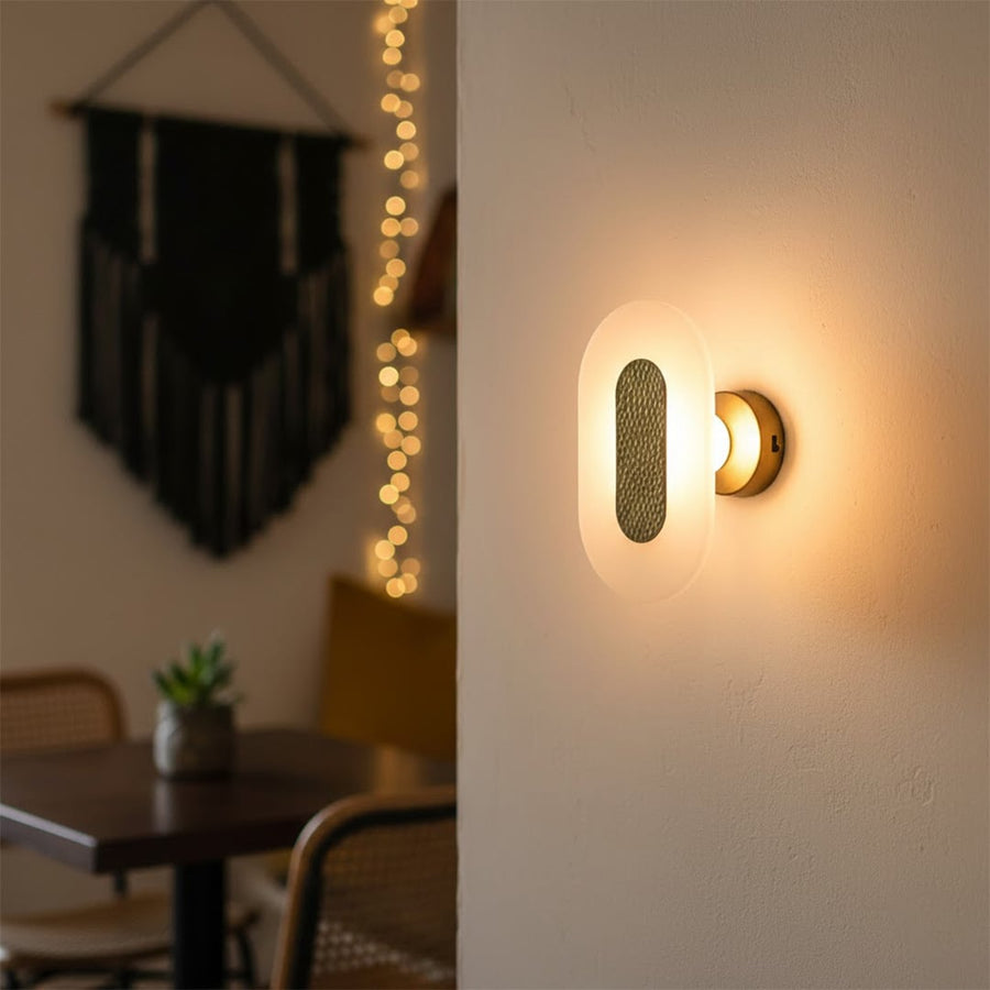 Modern gold textured wall light with warm ambient glow for stylish bedroom and premium decor spaces.

