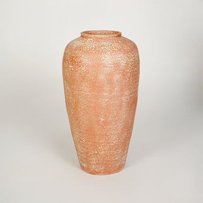 White background image of peach ceramic decorative vase for elegant floor placement with matte textured finish.