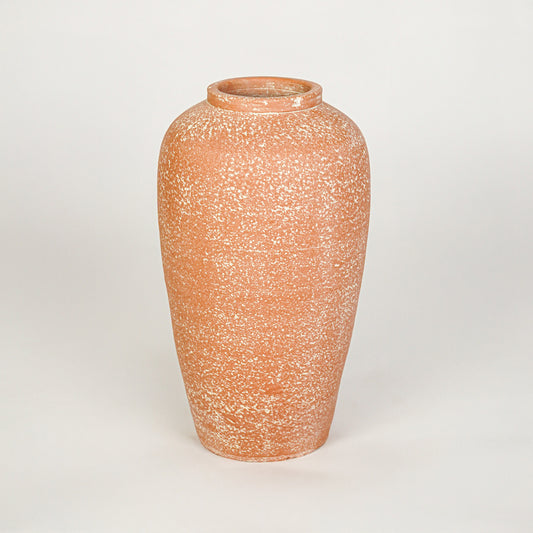White background image of peach ceramic floor vase for elegant interior decor styling with rustic finish.