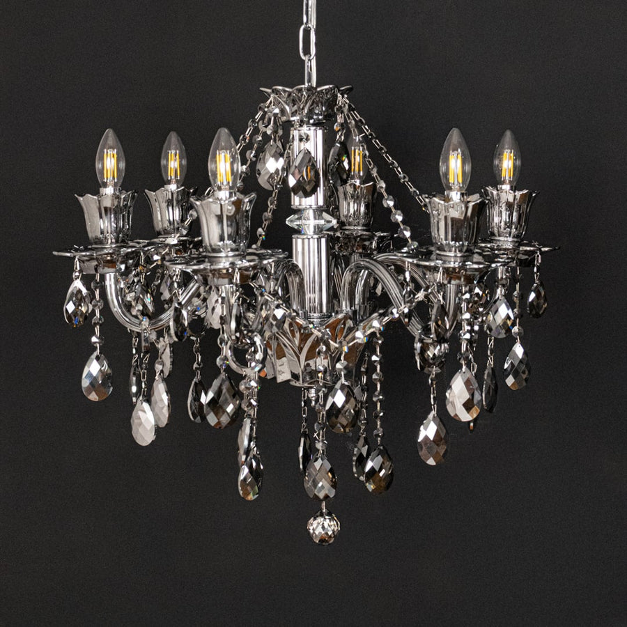 Black crystal chandelier shown on black background highlighting premium crystal detailing for elegant interiors.