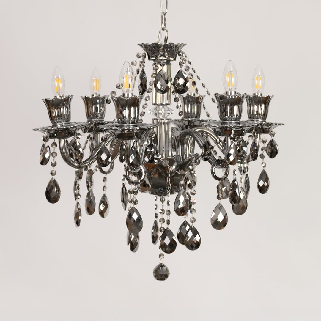Black crystal chandelier displayed on white background ideal for modern bold interior ceiling styling.