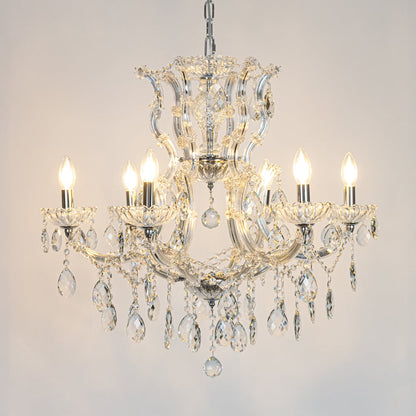 Chrome crystal chandelier glowing warmly on a white background adding luxury lighting style for modern living and hallway decor.