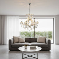 Elegant crystal glass chandelier with chrome accents and sparkling drops creating a luxurious statement for living and dining spaces.