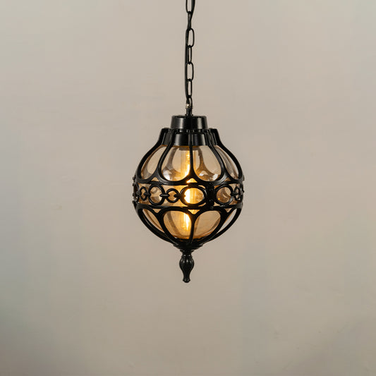 Black metal hanging outdoor lantern with decorative glass panels glowing on white background ideal for gate entrance and exterior lighting decor.