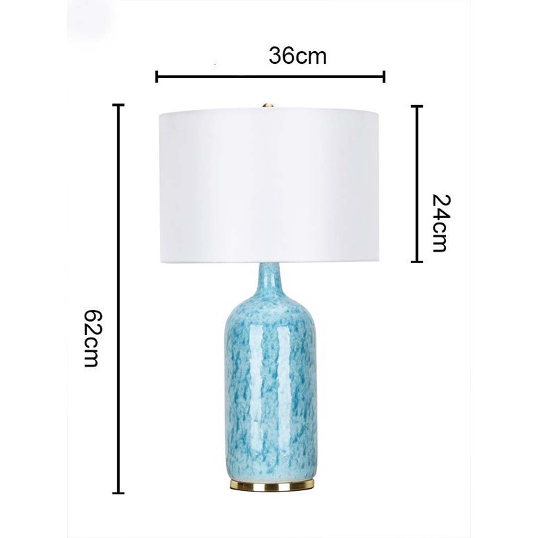 Blue ceramic table lamp 62 cm tall and 36 cm wide featuring gold base and white fabric shade ideal for modern elegant home decor.
