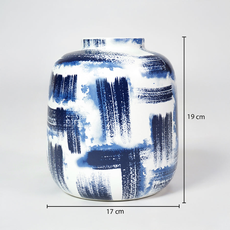 White ceramic rounded vase with blue brushstrokes, featuring dimension markings for clear catalog size reference.