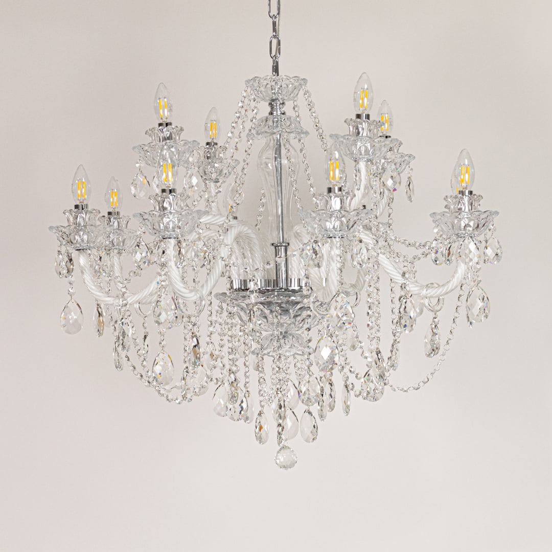 Large clear crystal chandelier displayed on white background ideal for classic bright interior ceiling styling.