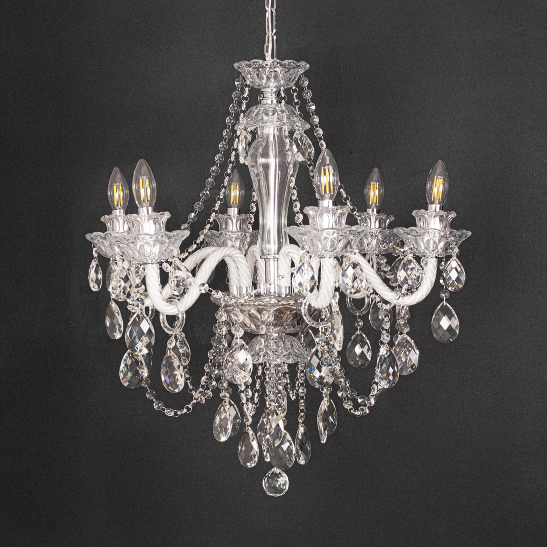 Clear crystal chandelier shown on black background highlighting premium crystal detailing for elegant ceilings.