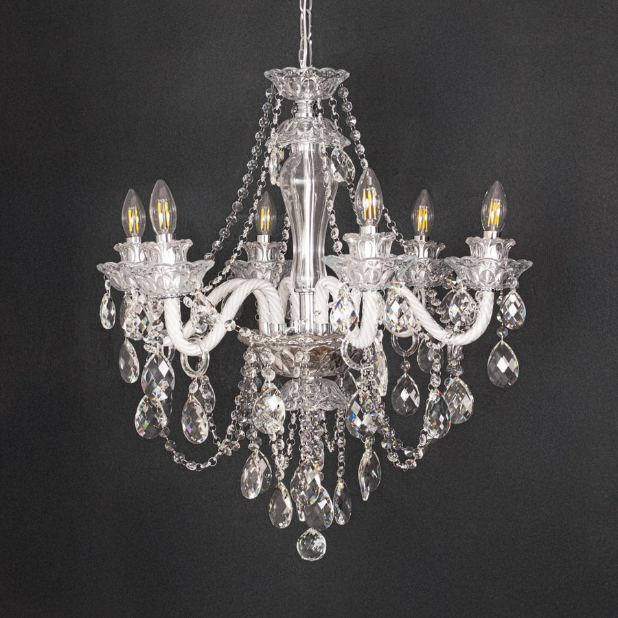 Clear crystal chandelier shown on black background highlighting premium crystal detailing for elegant ceilings.