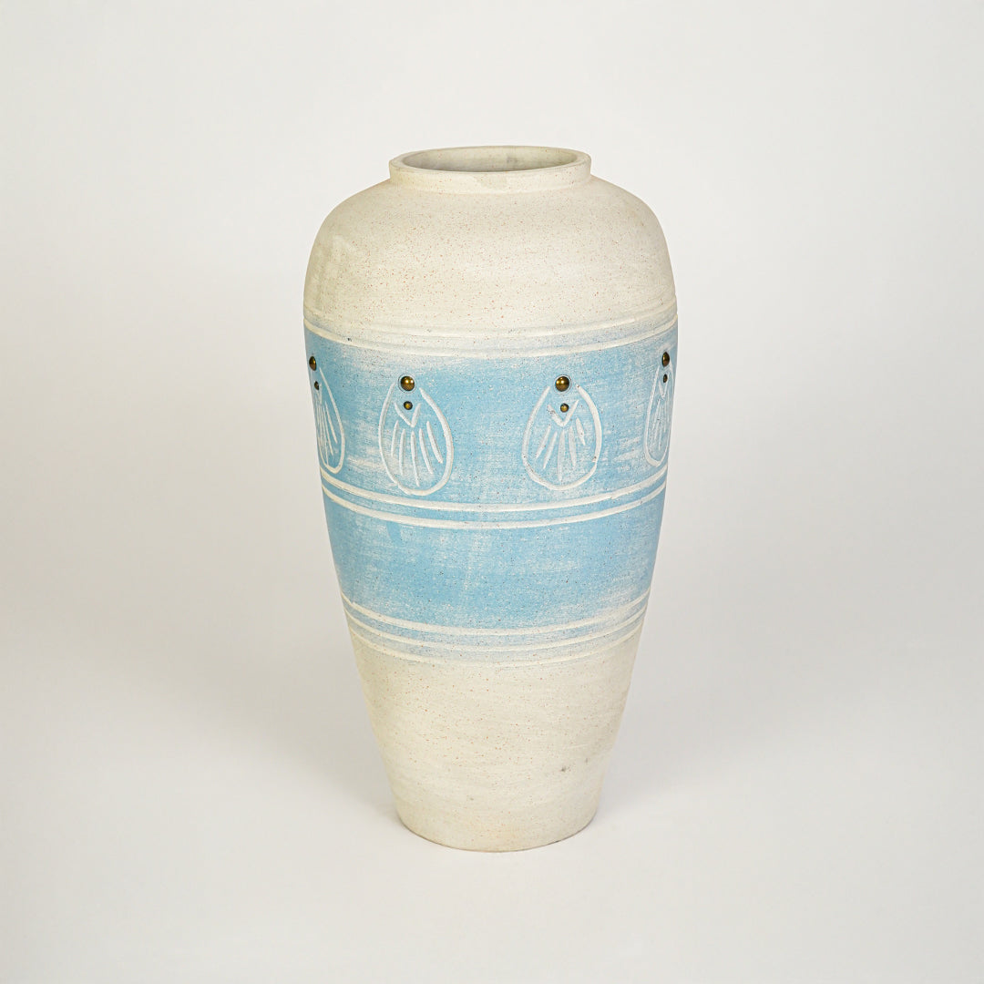 White background image of blue ceramic decorative vase for elegant floor placement with artistic textured finish.