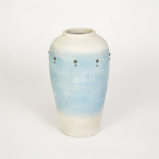 White background image of blue ceramic decorative vase for elegant floor placement with textured finish.