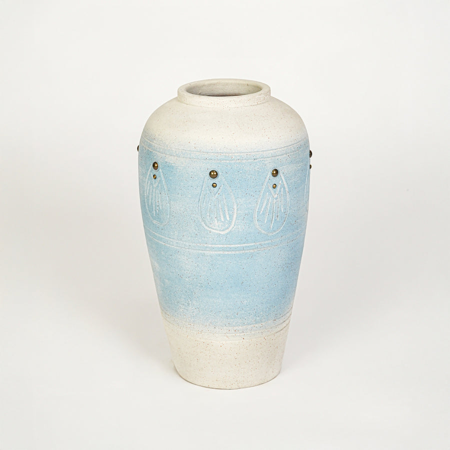White background image of blue ceramic decorative vase for elegant floor placement with textured finish.