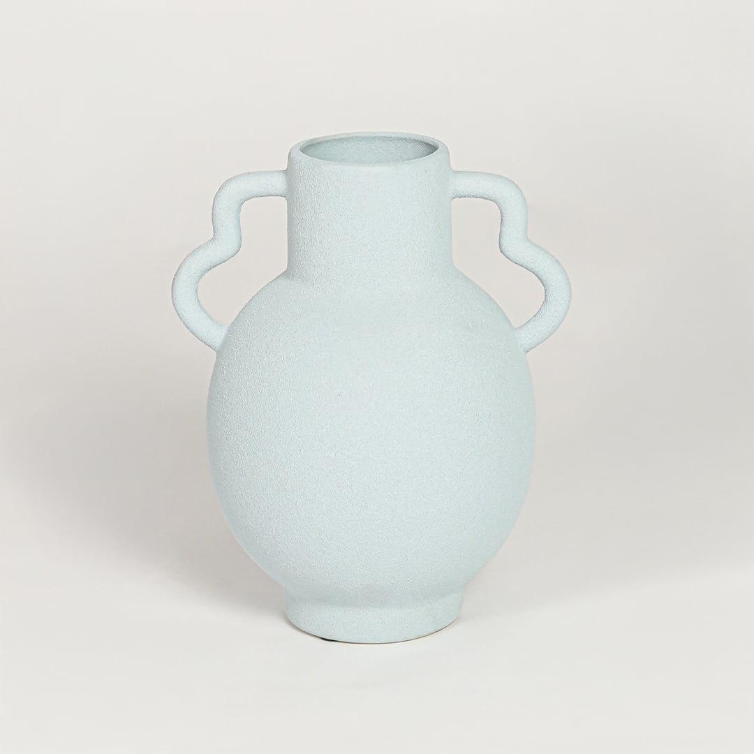 Minimal slab blue ceramic flower vase with sculpted handles ideal for entryway table living room shelf or dining decor display.