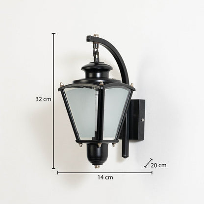 Black metal outdoor wall lantern measuring 32 cm height 14 cm width and 20 cm projection suitable for exterior walls.