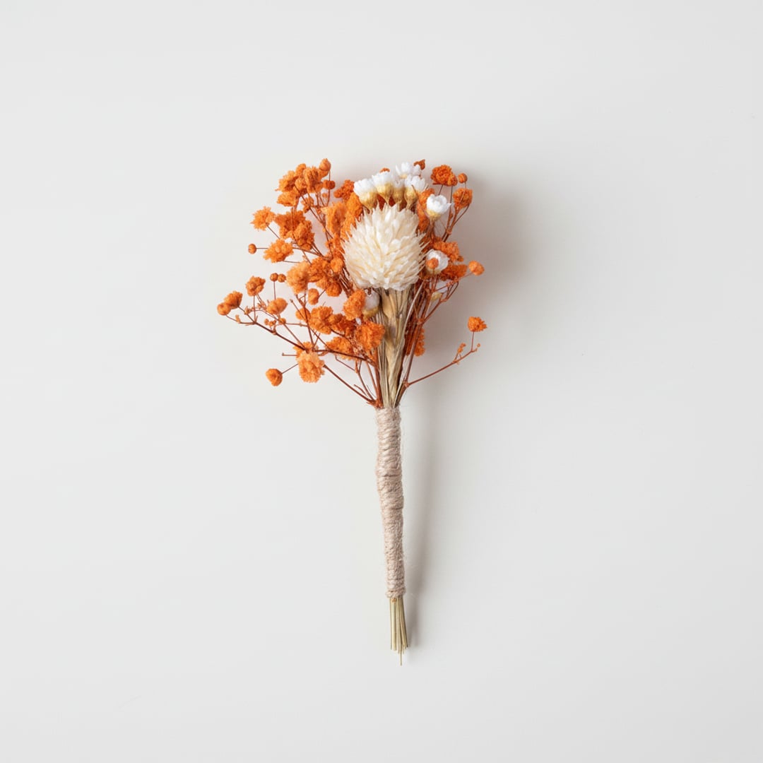 Dried floral stem bouquet with orange blossoms and ivory center on white background highlighting warm tones natural texture handcrafted decor elegance.