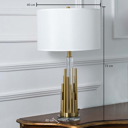 Gold metal table lamp with white drum shade and tiered cylindrical base shown with clear dimensions of 40 cm width 72 cm height and 40 cm depth ideal for bedside or living room placement.