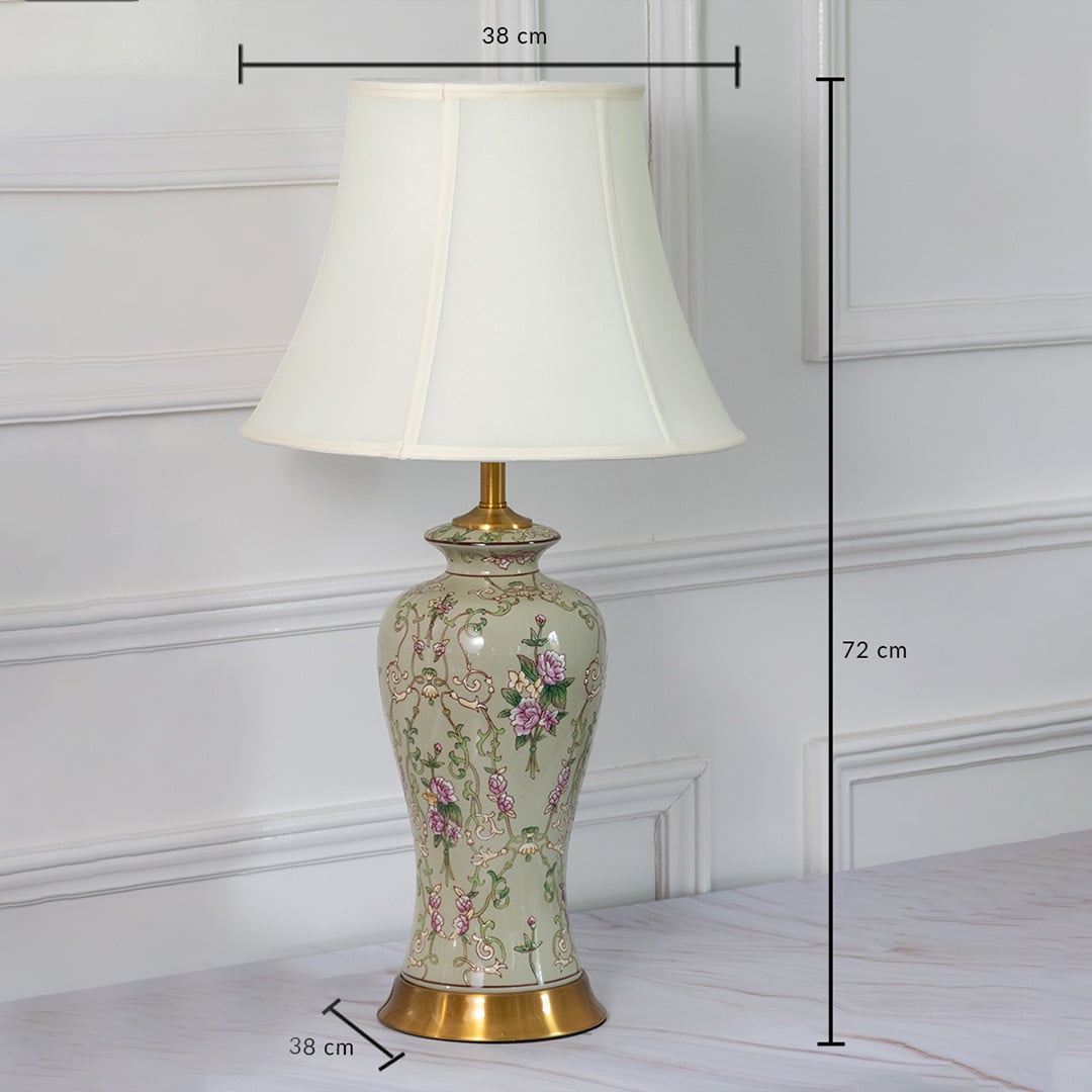 Ceramic table lamp with floral artwork shown with 72 cm height and 38 cm width measurements for home decor styling.