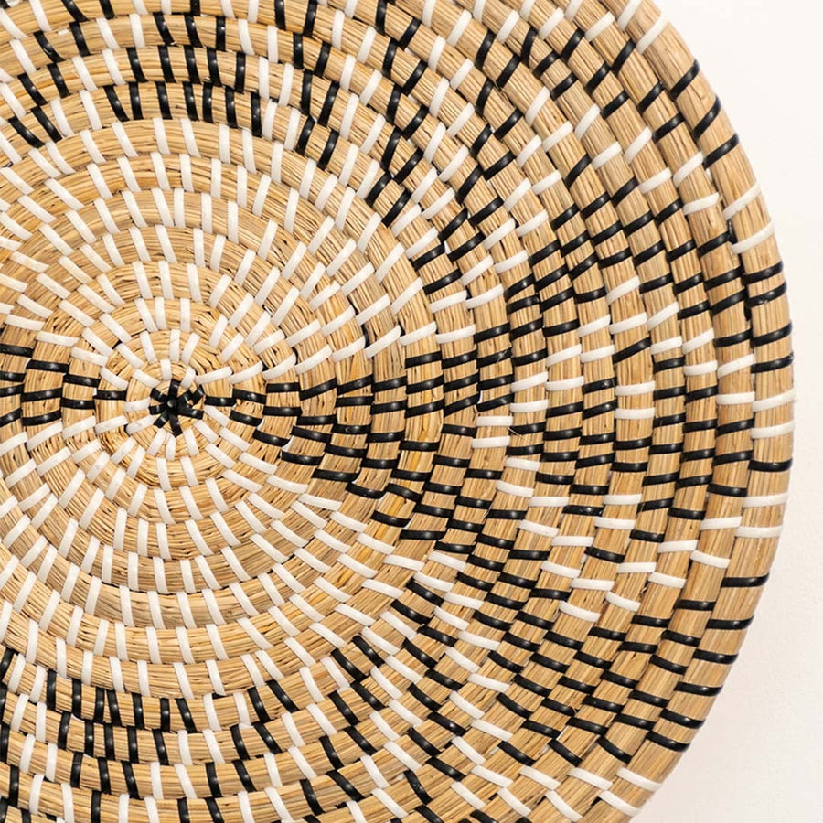 Closeup view of handwoven wall basket pattern showcasing natural fiber texture intricate weave and artisan Decor detailing.