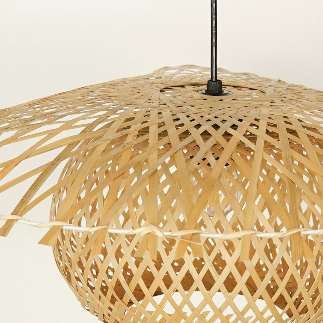 Closeup of handwoven bamboo pendant light with natural finish showcasing intricate craftsmanship.