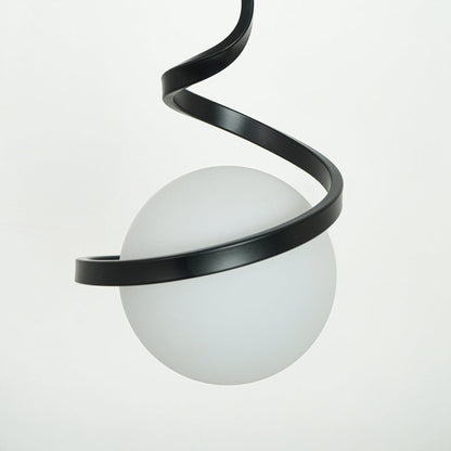 Closeup of black metal spiral pendant light showcasing sleek curves and premium craftsmanship.