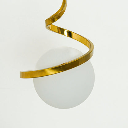 Detailed view of gold metal spiral pendant light with white glass globe and refined craftsmanship.