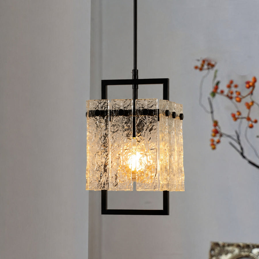 Modern wall light with crystal glass shade and black frame enhancing sophisticated home decor.