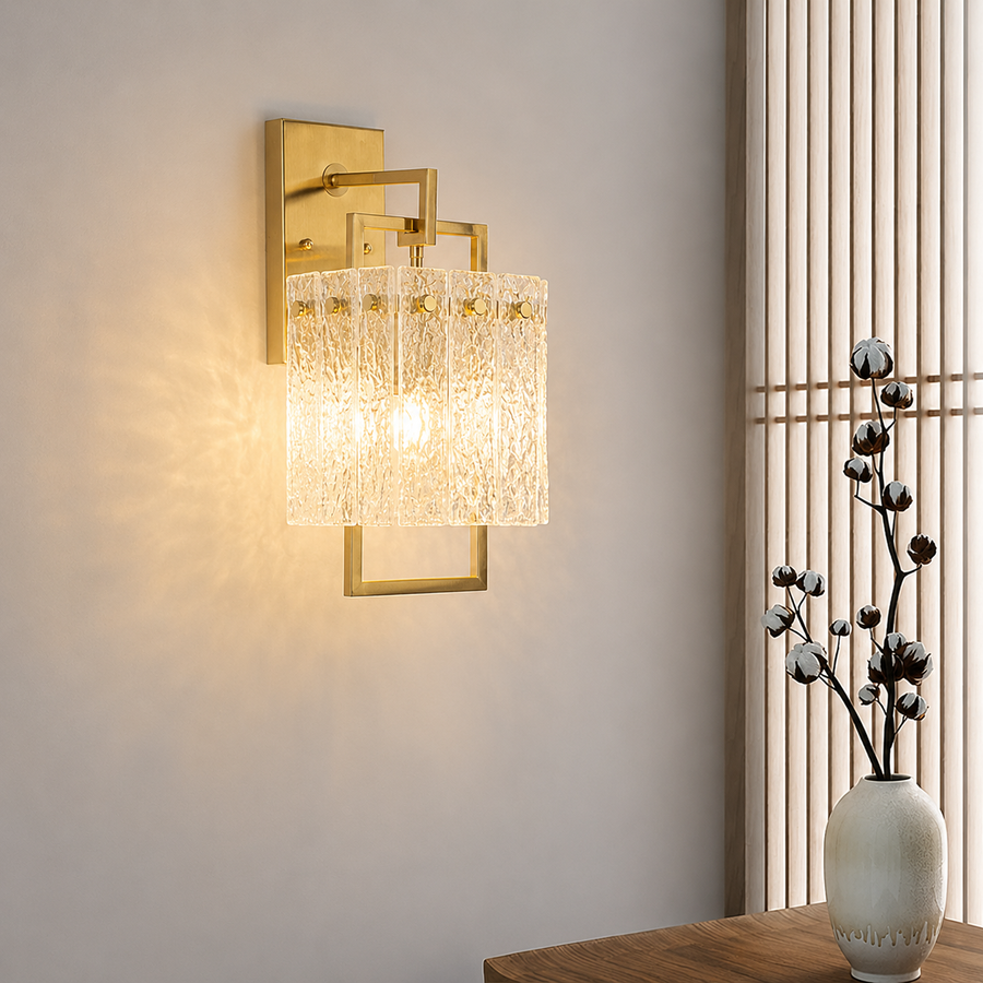 Lifestyle image of gold metal cracked glass wall light for elegant hallway decor styling with modern home lighting design.