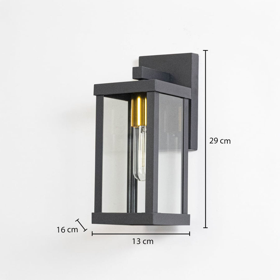 Black metal outdoor wall light measuring 29 cm height 13 cm width and 16 cm projection suitable for exterior walls.