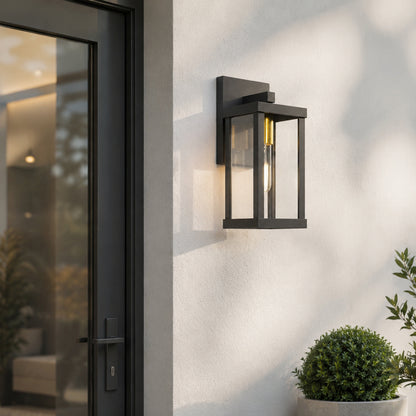 Black metal outdoor wall light lifestyle image with warm glow for elegant exterior entryway decor.