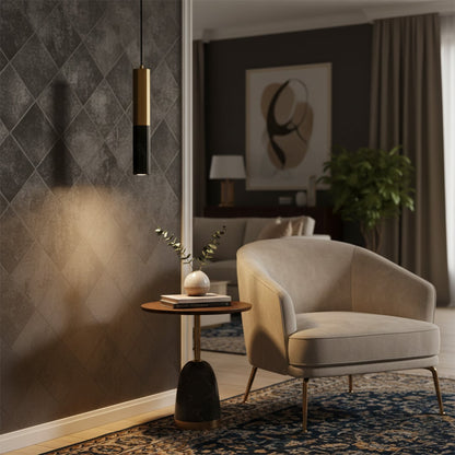 Elegant wall pendant light illuminating a cozy seating corner creating a refined interior mood with textured walls and ambient lighting.