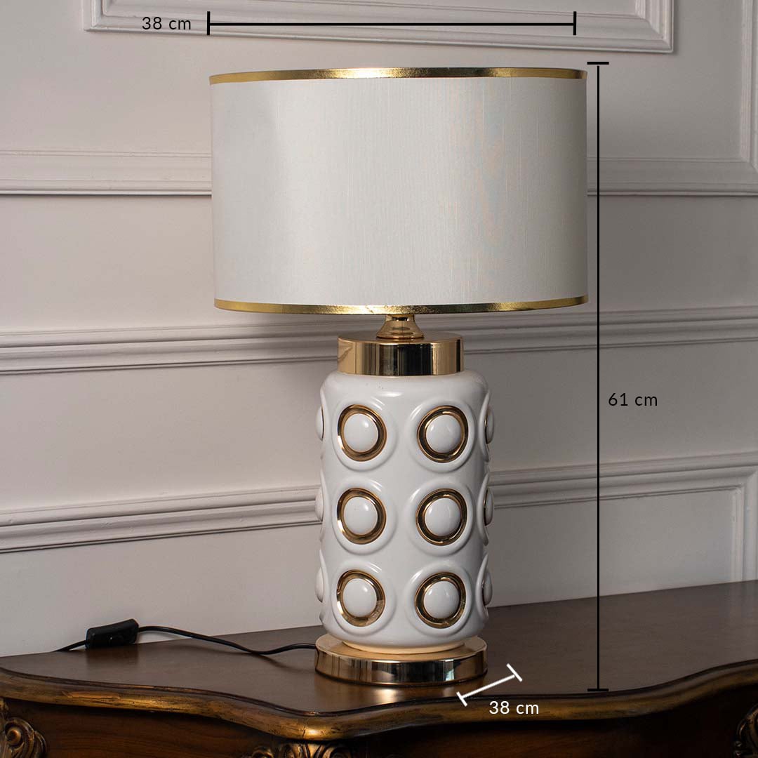 Table lamp with cylindrical ceramic base and drum shade showing 61 cm height and 38 cm width for accurate size reference.