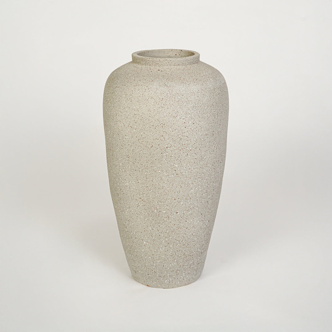 White background image of beige ceramic floor vase for elegant interior decor styling with textured matte finish.