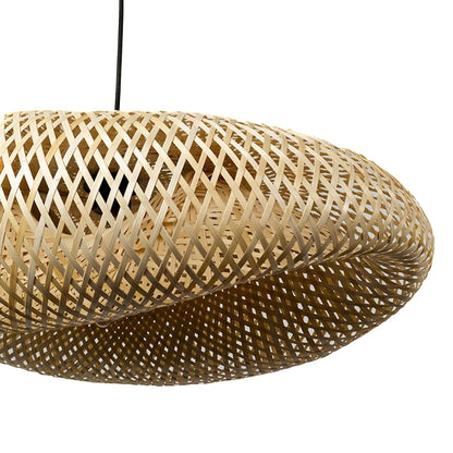Closeup of handwoven rattan pendant light showcasing natural beige texture and artisanal craftsmanship.
