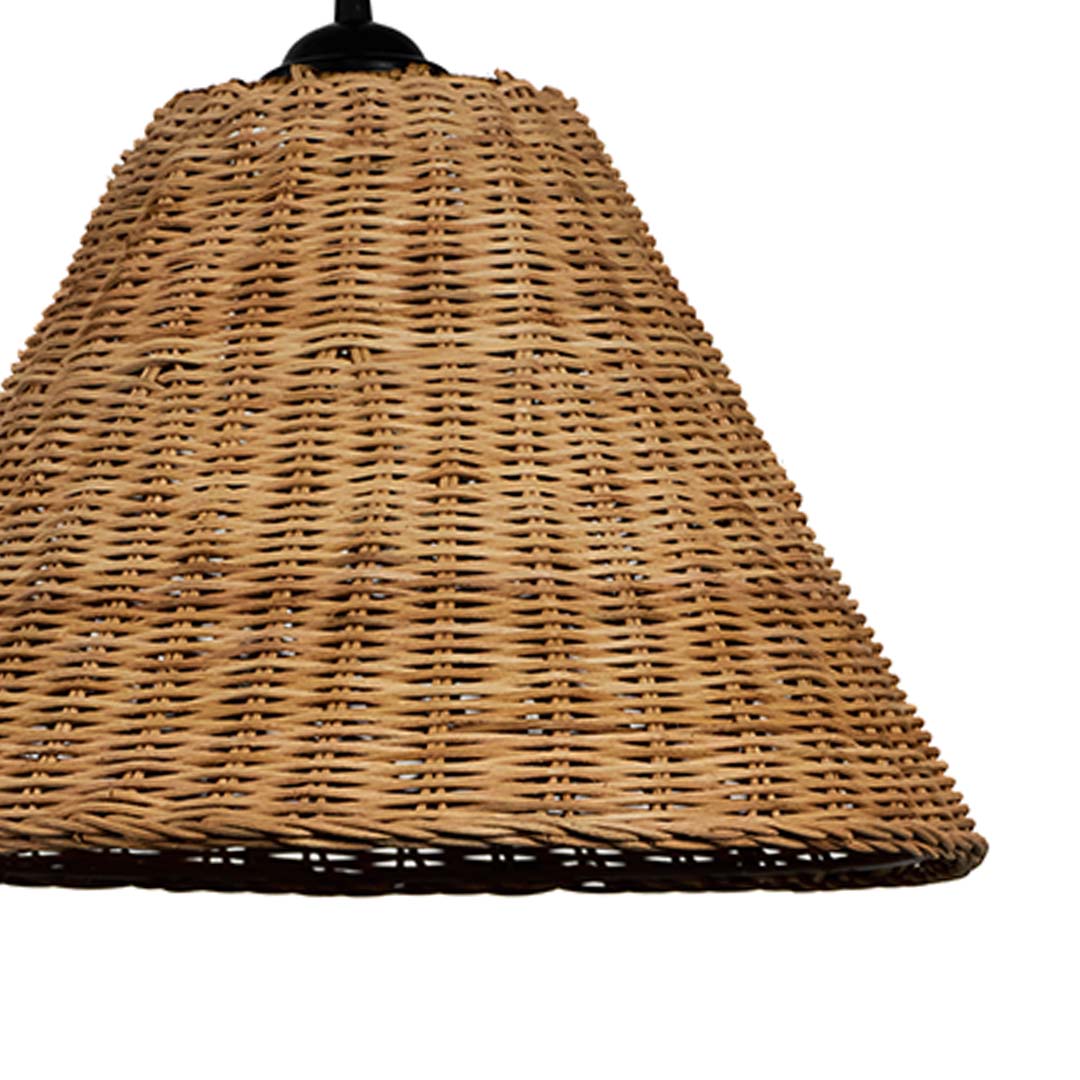 Closeup of woven rattan pendant light highlighting fine craftsmanship and intricate handwoven detailing.