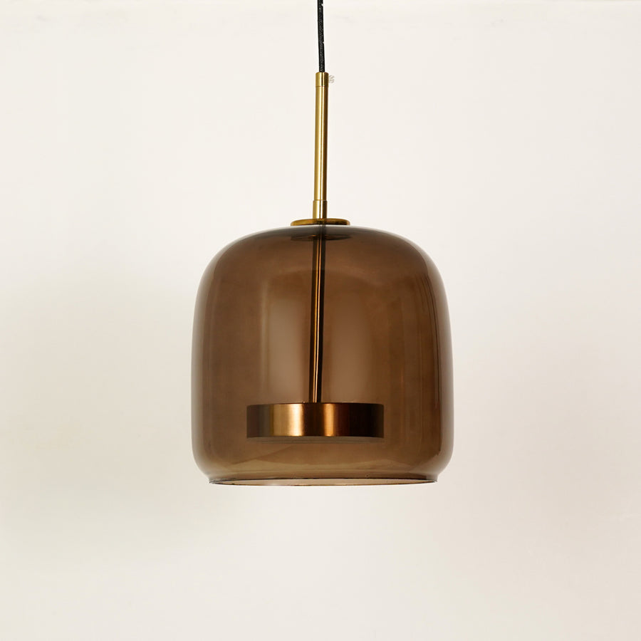 White background image of round shade sunbeam glass pendant light off for elegant dining room decor styling and modern home lighting.