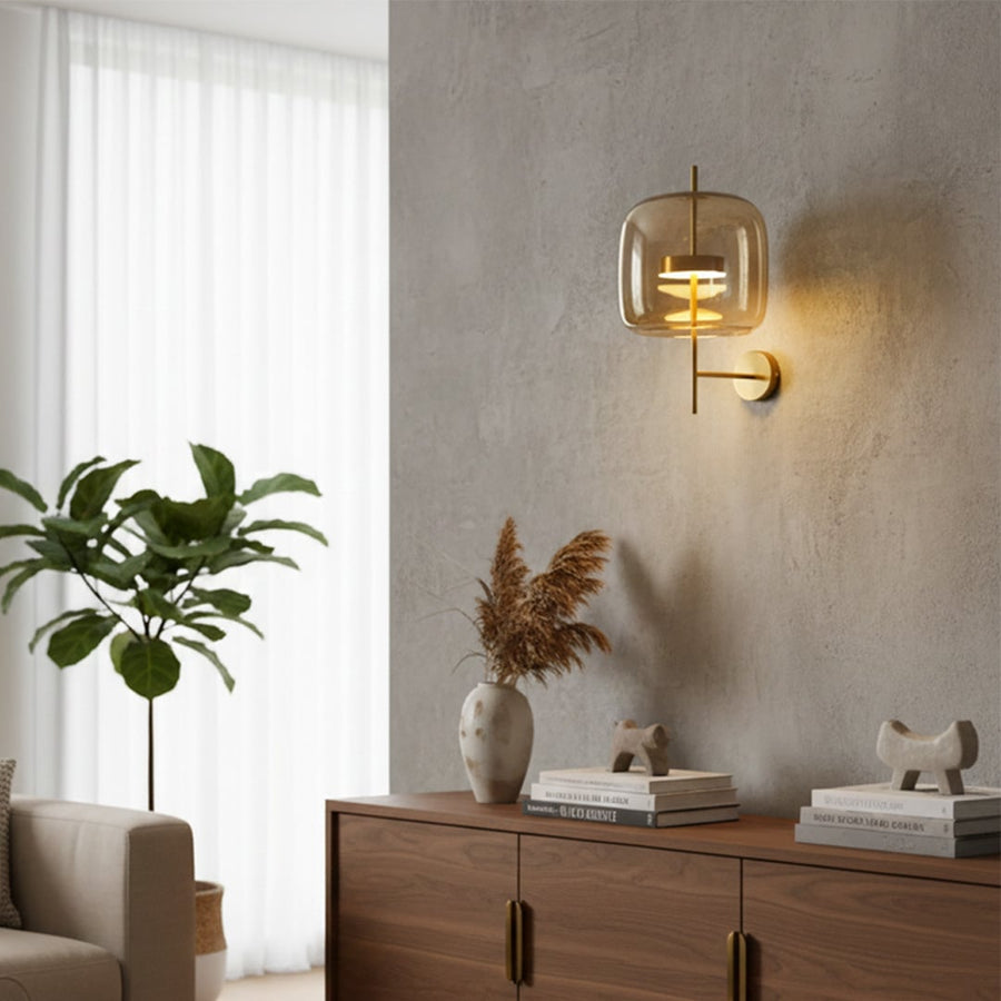 Modern gold glass wall light with warm glow for luxury living room and elegant home decor styling spaces.
