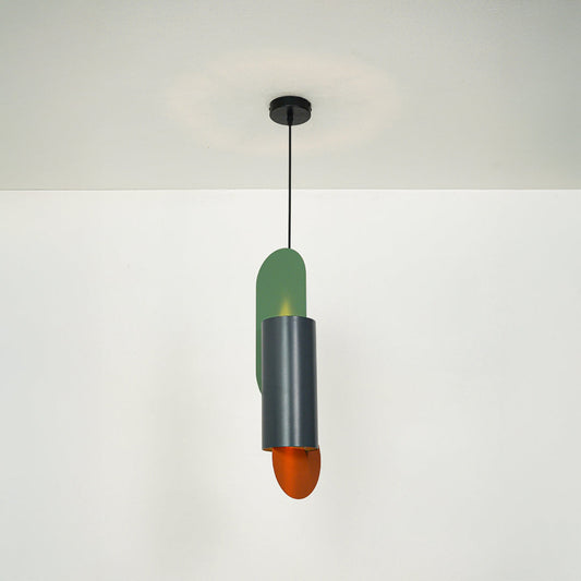 Contemporary pendant light with green and orange metal shades suspended in minimal space ideal for modern living room or dining area lighting.

