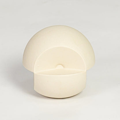 Minimal cream ceramic round decor accent with hollow front detail suitable for shelf styling tabletop display and modern interiors.
