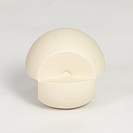 Minimal cream ceramic round decor accent with hollow front detail suitable for shelf styling tabletop display and modern interiors.